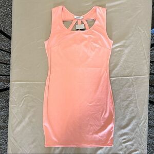Solemio peach color dress in a size medium.